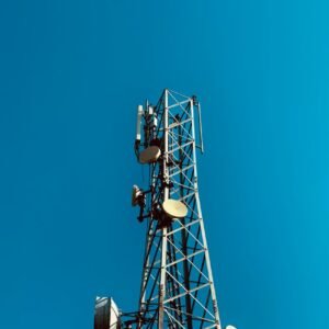 a cell phone tower with a blue sky in the background